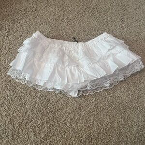 Edikted white lace lined mini skirt. Size small. Never worn. Tags still intact.